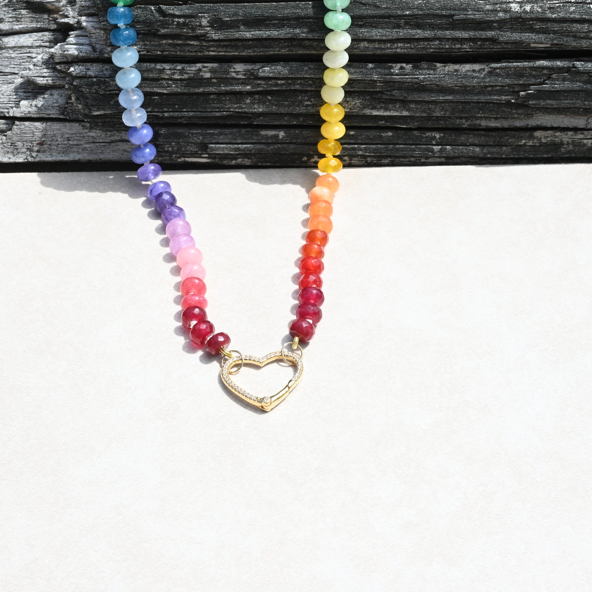 Brightly colored Ombre Rainbow Hand Knotted Gemstone Necklace with gold filled connector.