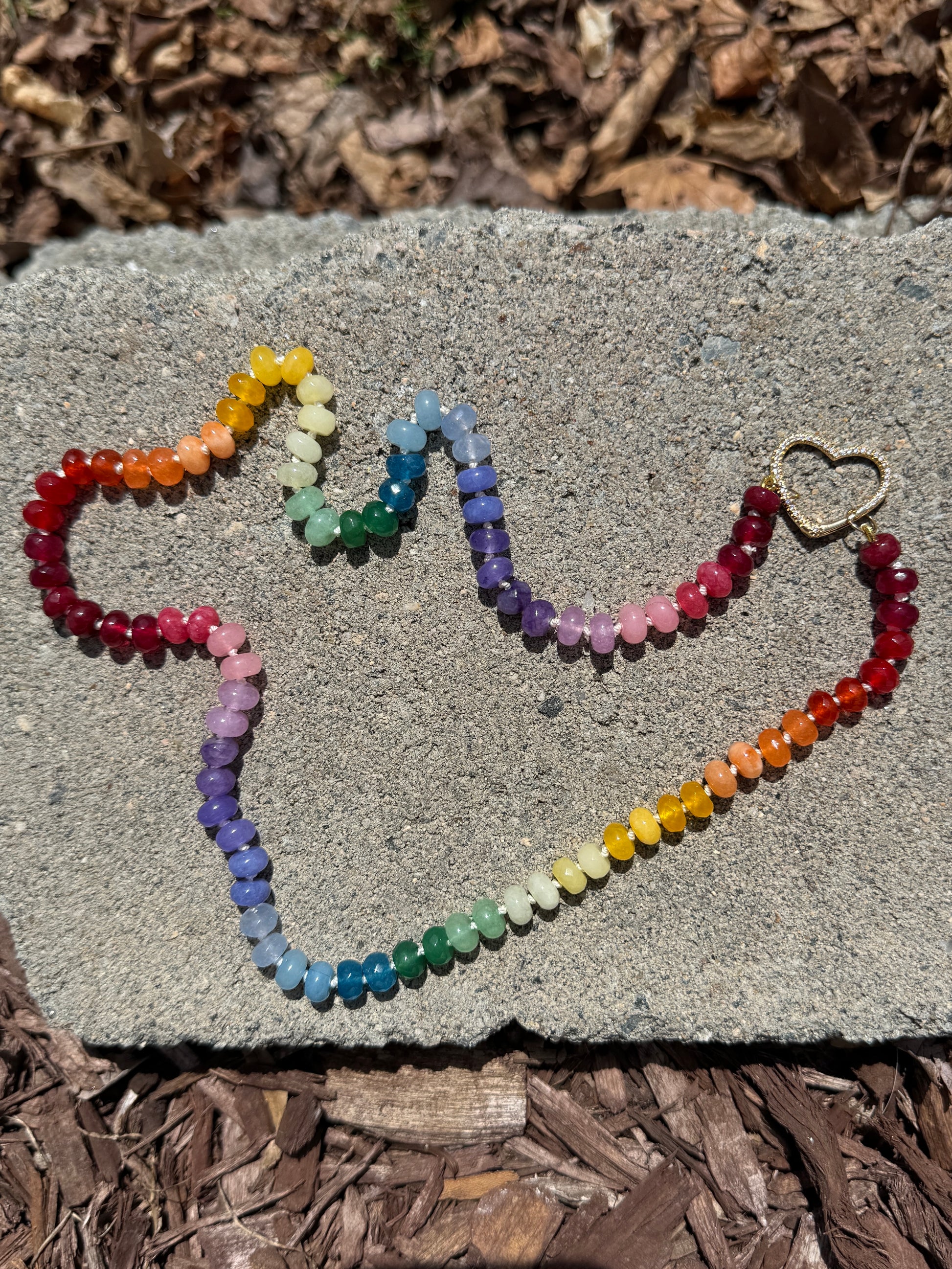 Brightly colored Ombre Rainbow Hand Knotted Gemstone Necklace with gold filled connector.