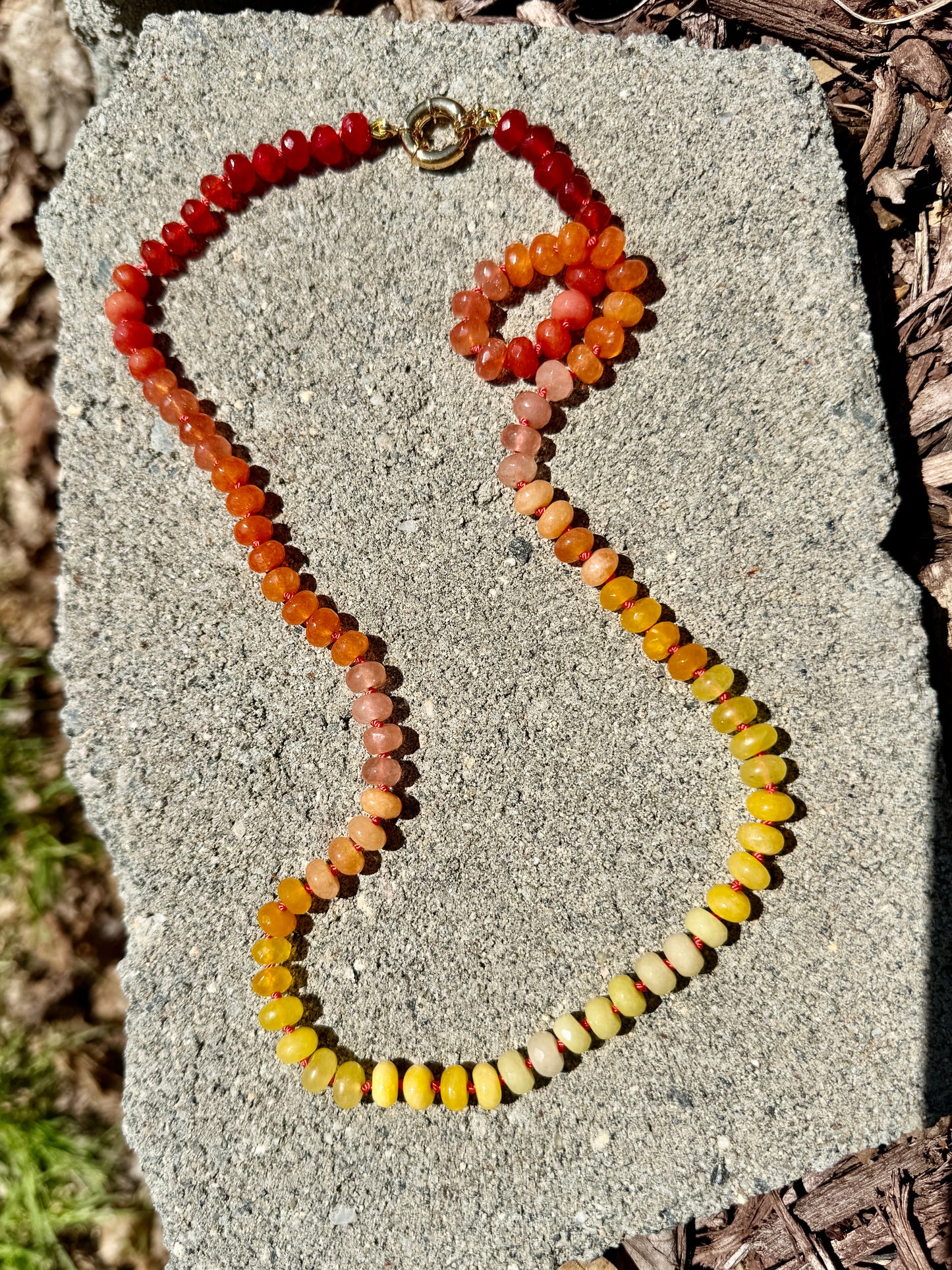 Hand Knotted Summer Sunset Gemstone Beaded Necklace. Made with orange, red and yellow Jade beads.