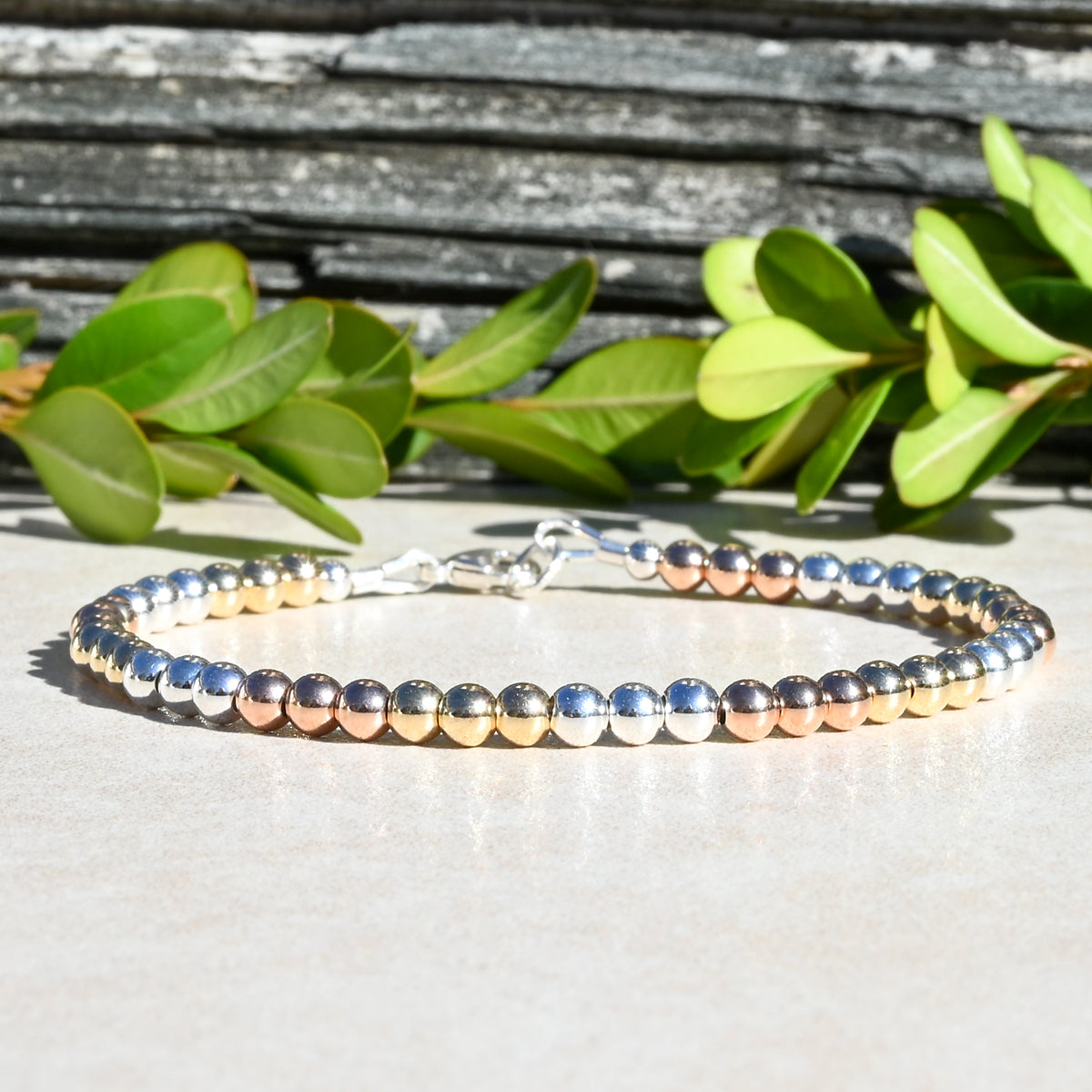 The Mixed Metal Beaded Bracelet, Rose Gold, Yellow Gold, and Sterling Silver