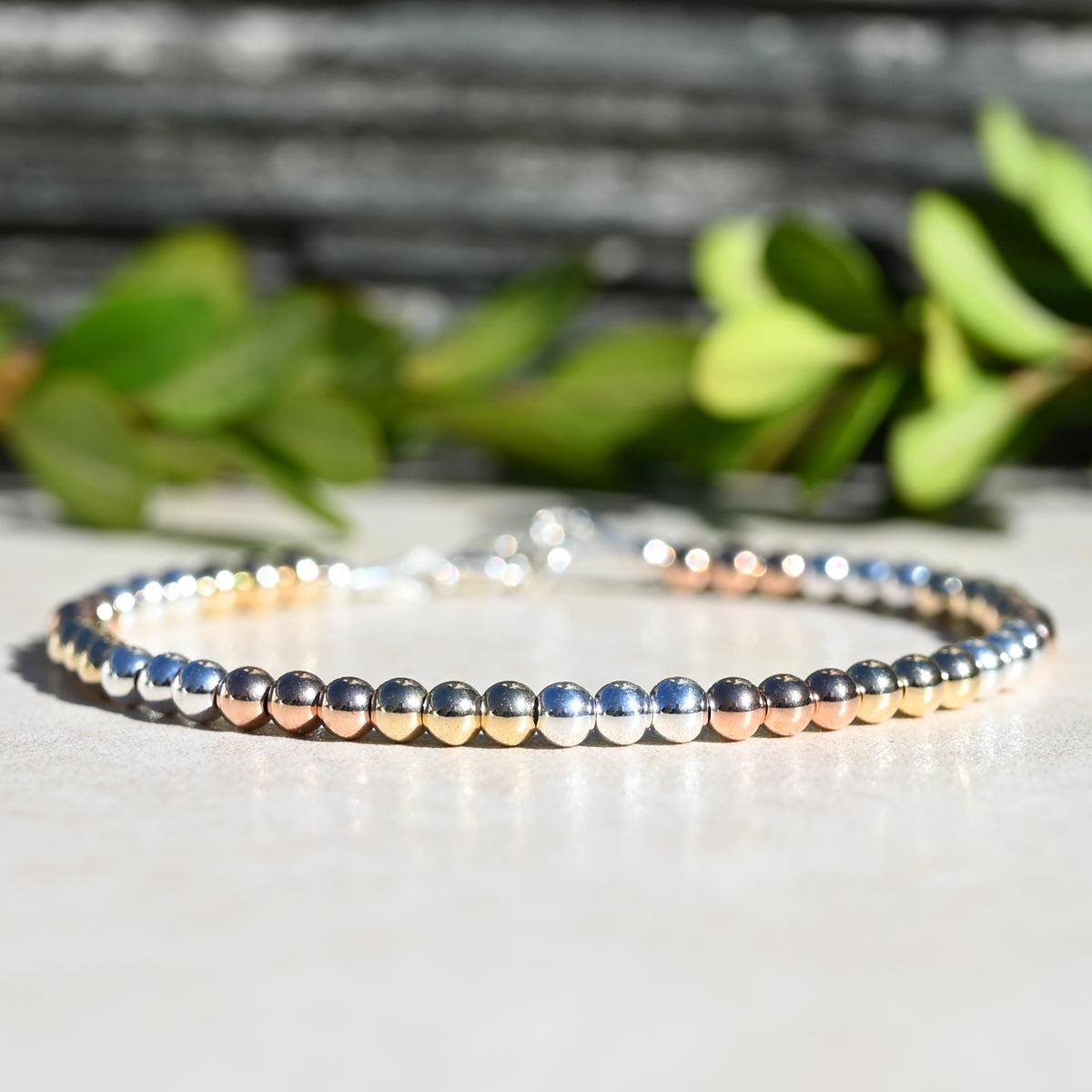 The Mixed Metal Beaded Bracelet, Rose Gold, Yellow Gold, and Sterling Silver