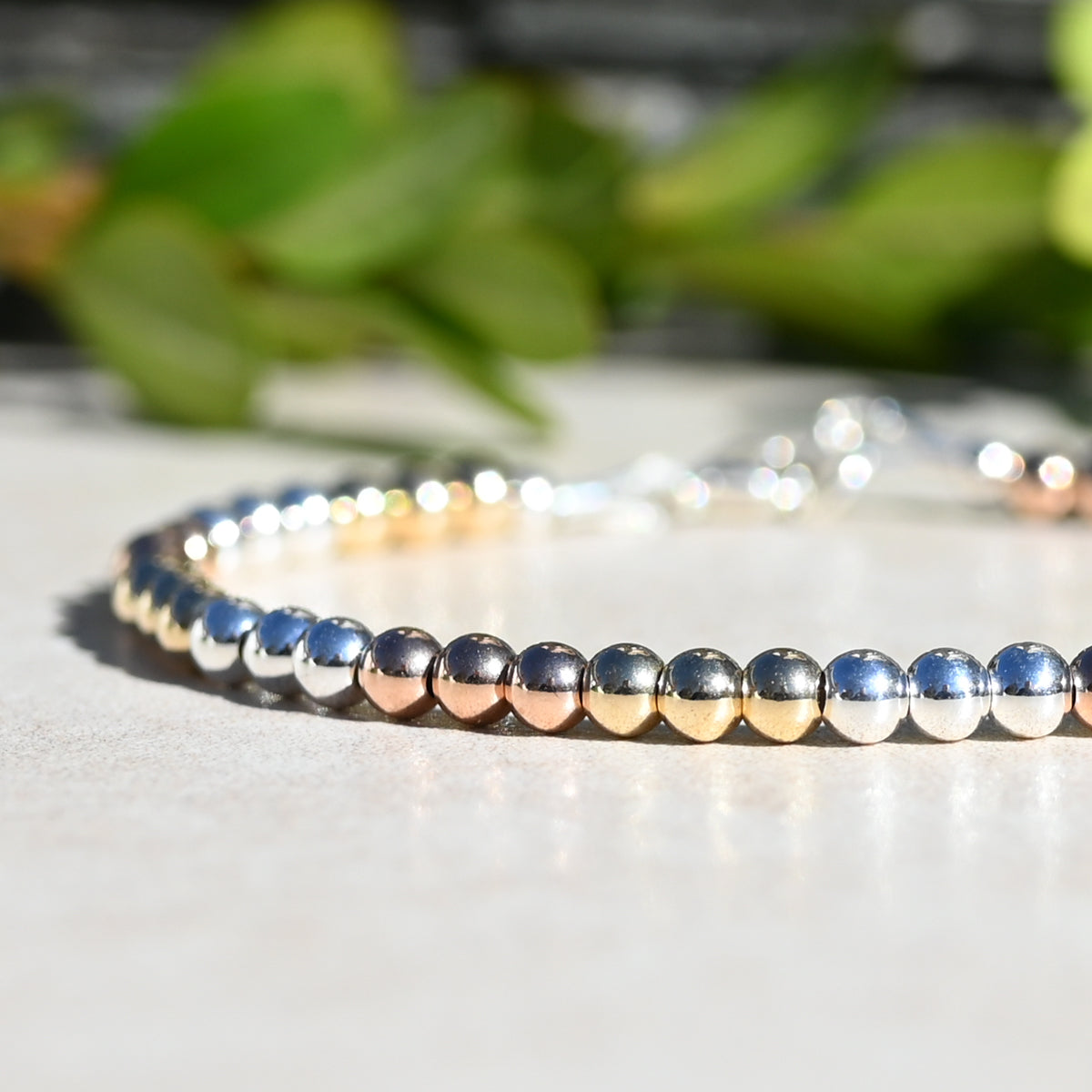The Mixed Metal Beaded Bracelet, Rose Gold, Yellow Gold, and Sterling Silver