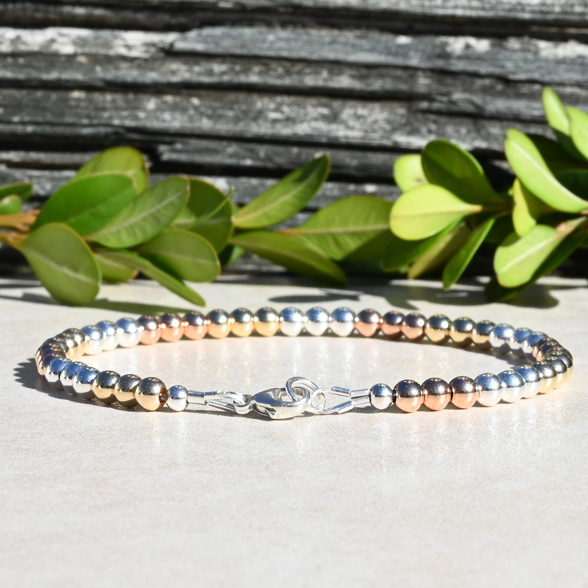 The Mixed Metal Beaded Bracelet, Rose Gold, Yellow Gold, and Sterling Silver