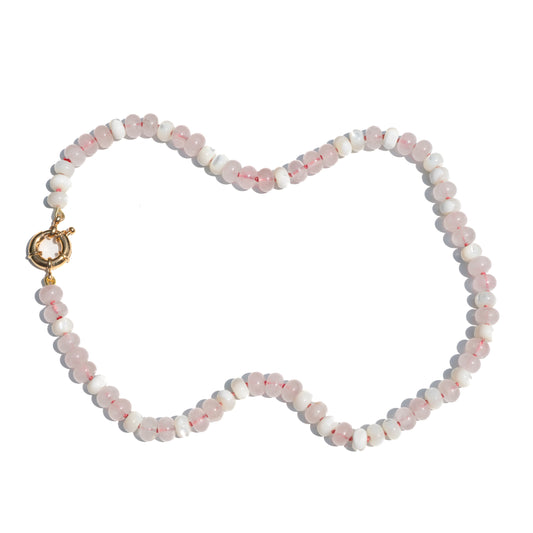 Rose Quartz and mother of pearl hand knotted necklace finished with a gold filled clasp.