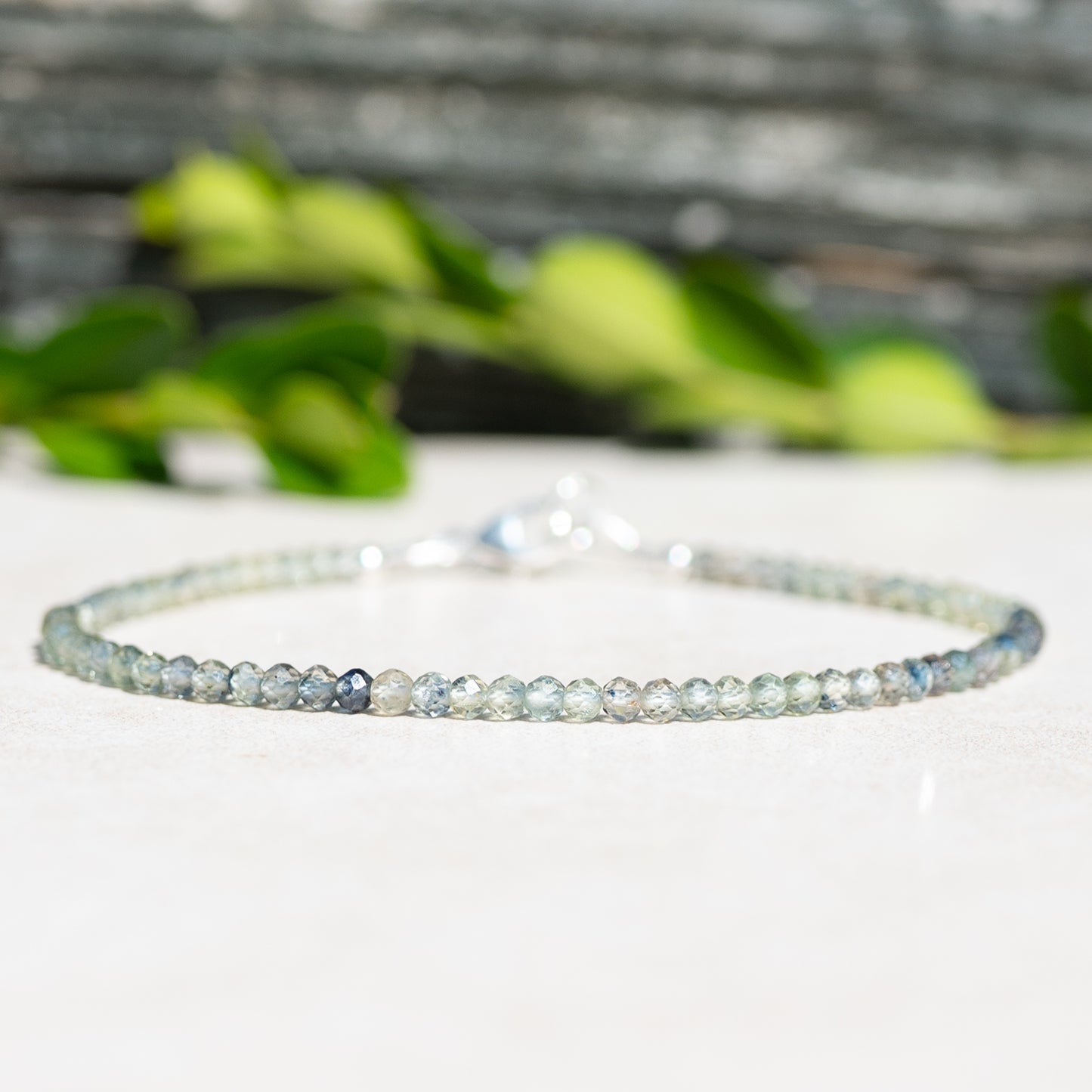 Green Sapphire beaded gemstone bracelet with shades of blues and greens.