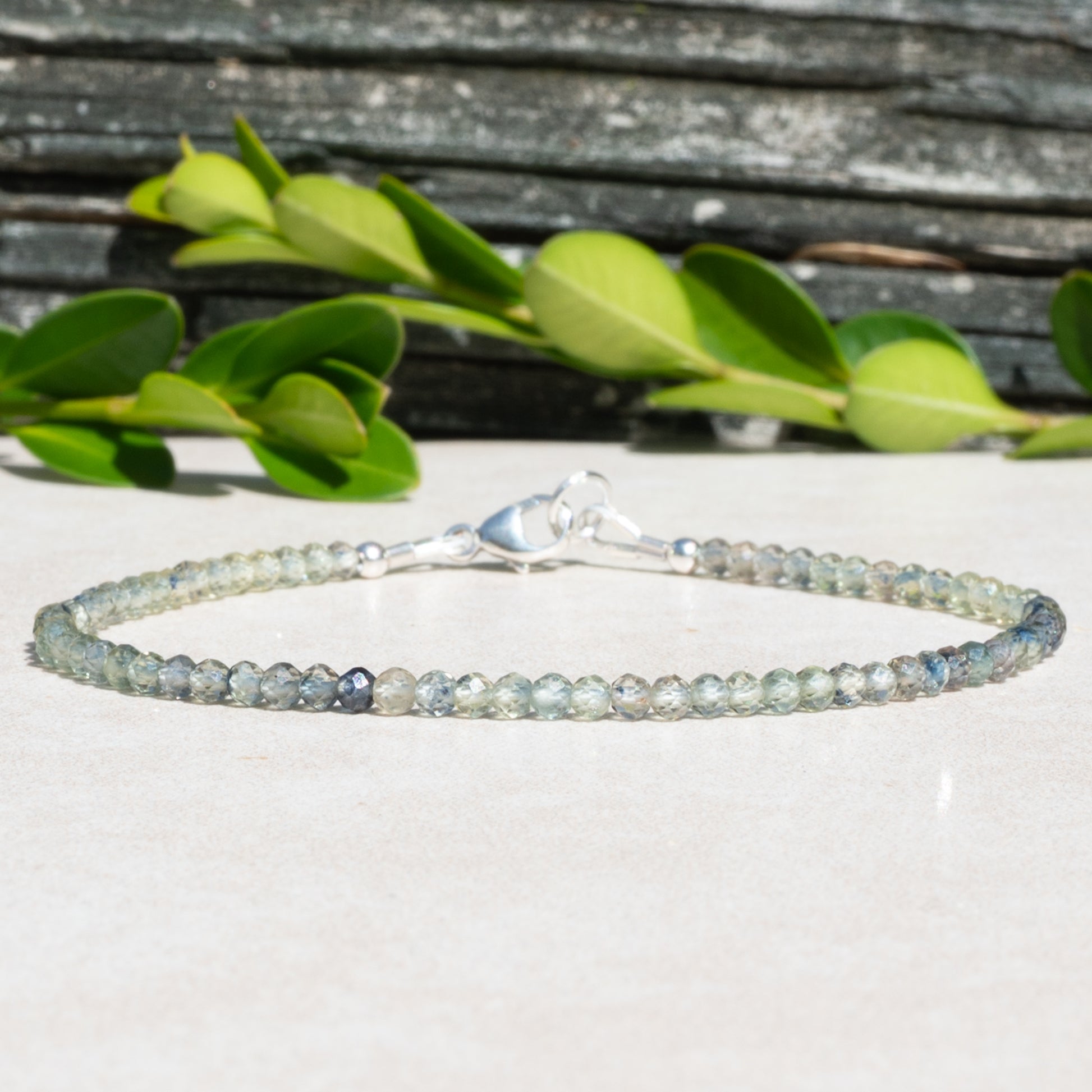 Green Sapphire beaded gemstone bracelet with shades of blues and greens.
