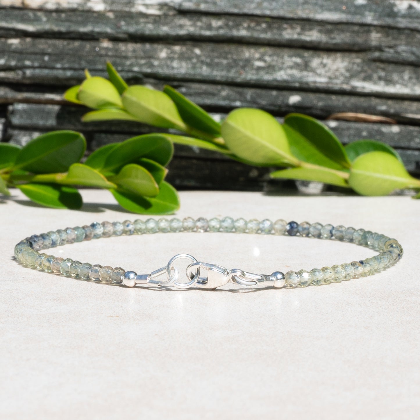 Green Sapphire beaded gemstone bracelet with shades of blues and greens.