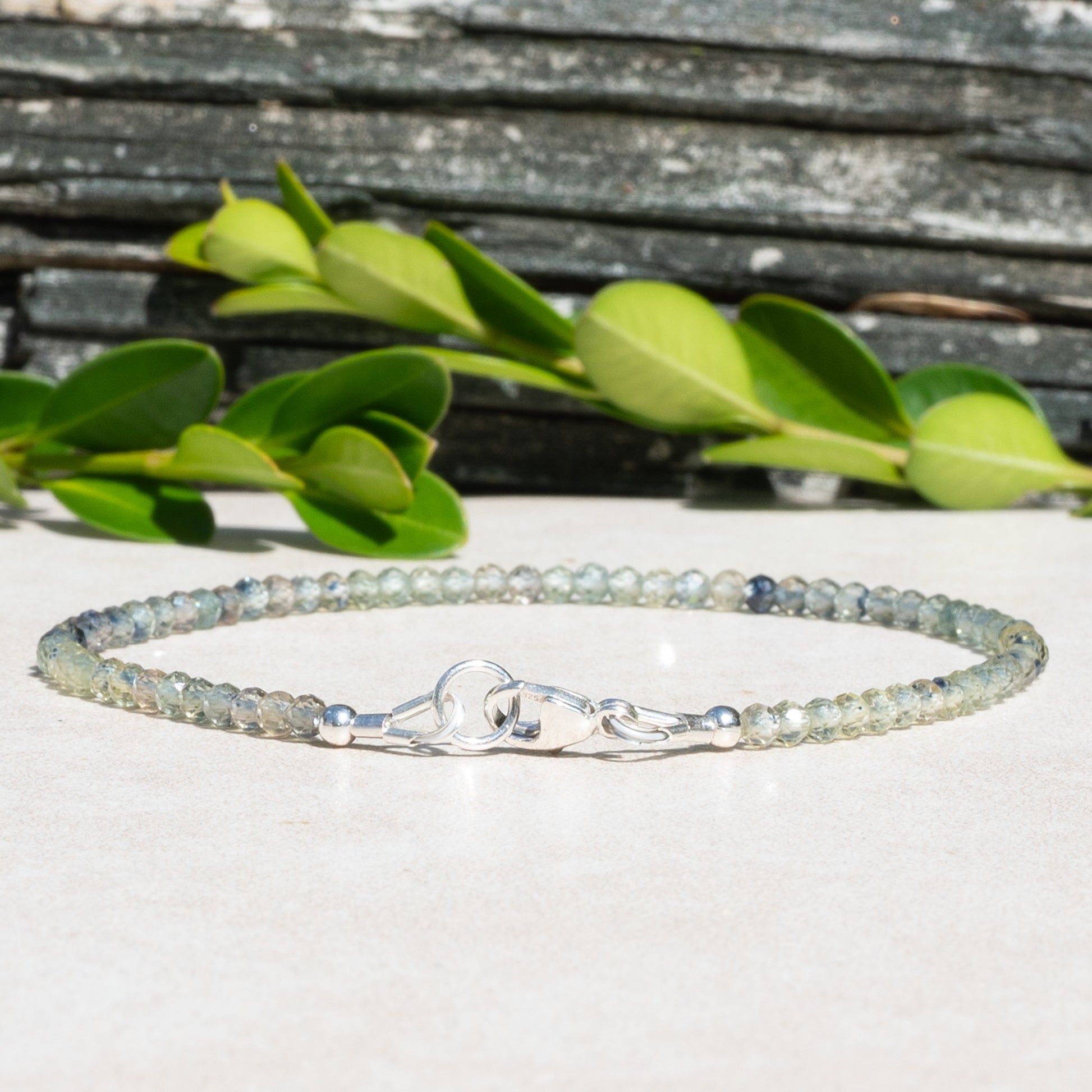 Green Sapphire beaded gemstone bracelet with shades of blues and greens.