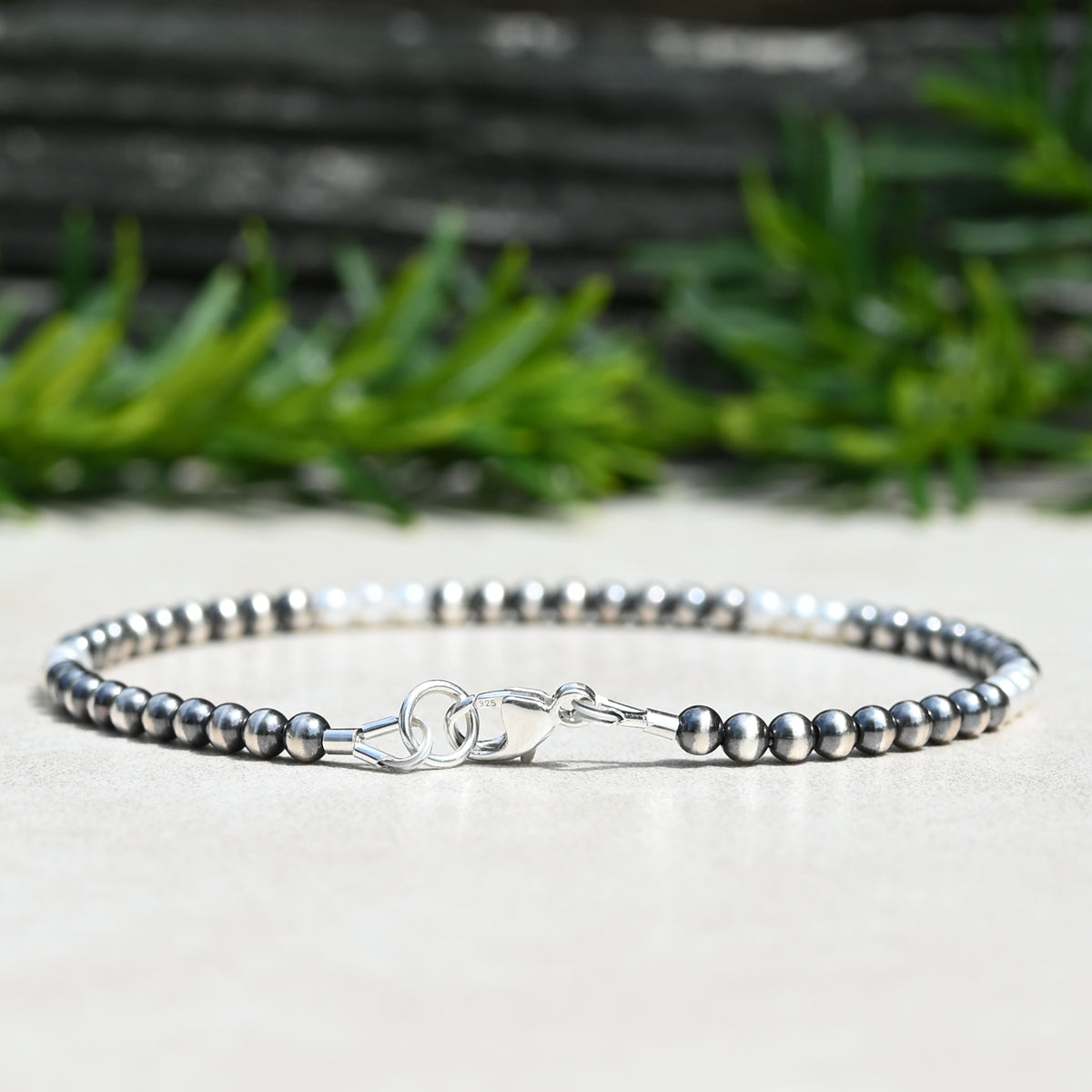 A Sterling Silver and Freshwater Pearl beaded bracelet 