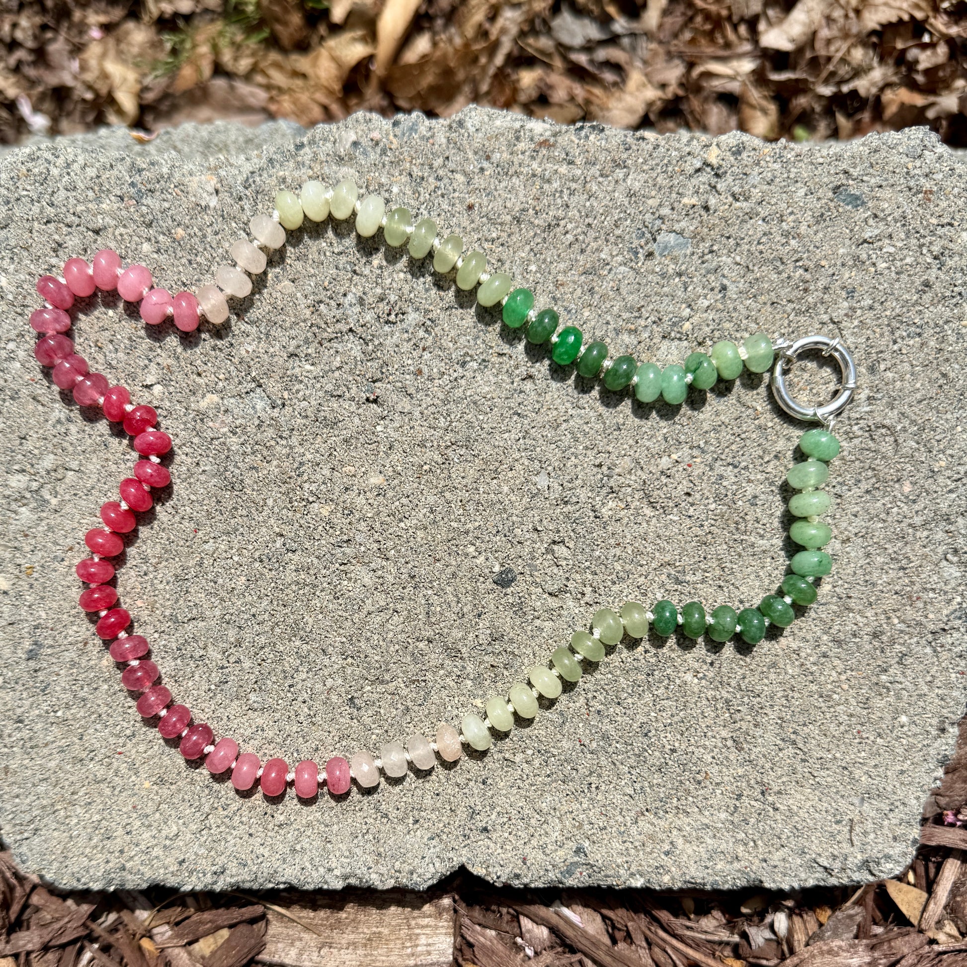 Watermelon colored ombre hand knotted necklace. 20.5 inches long.
