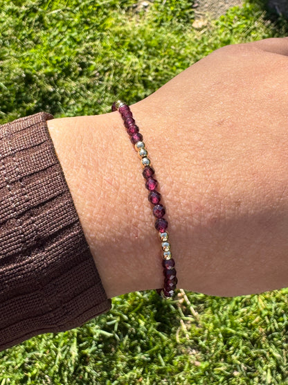 Natural Purple Garnet Beaded Bracelet on a wrist