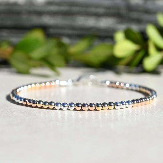 The Mixed Metal Beaded Bracelet, Rose Gold, Yellow Gold, and Sterling Silver